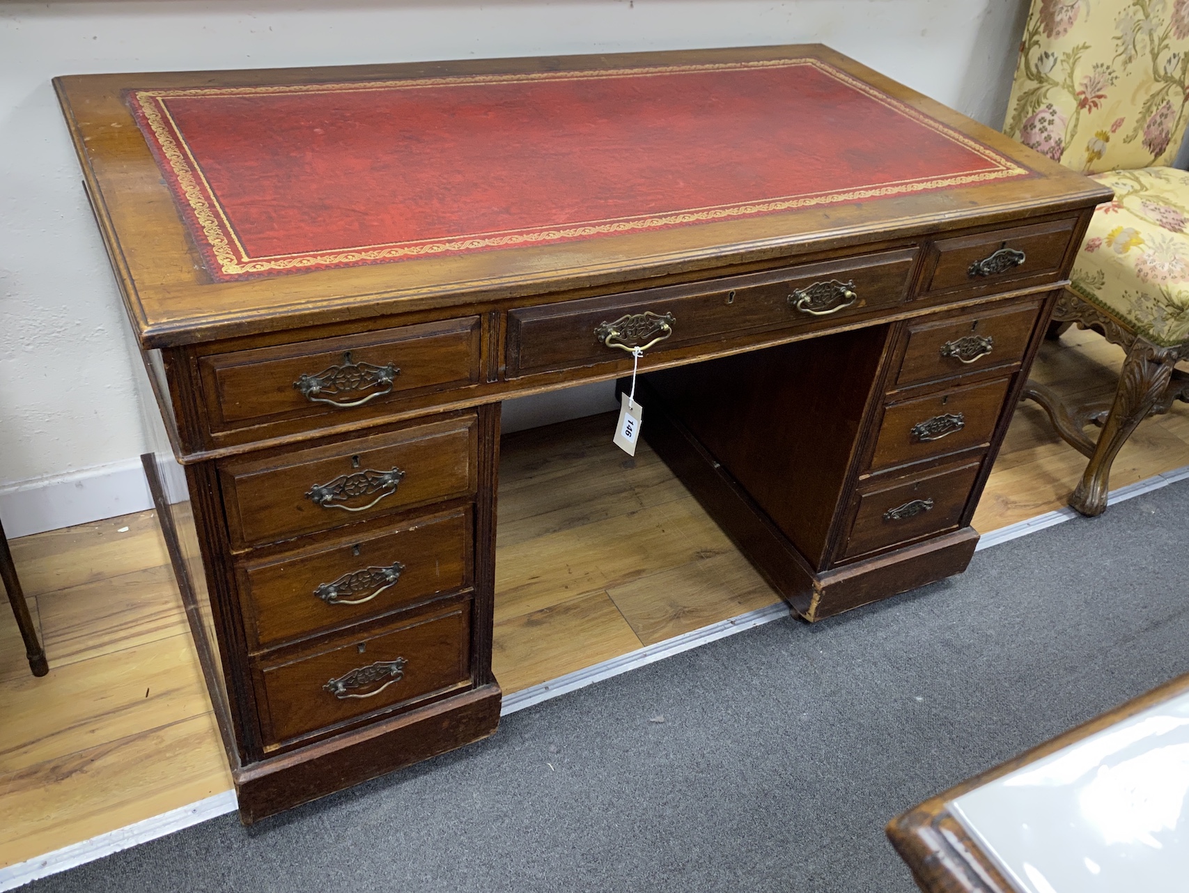 A late Victorian mahogany pedestal desk, width 122cm, depth 66cm, height 72cm